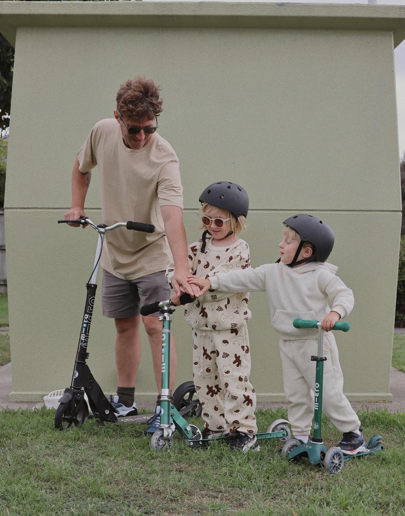 dad on his adult scooter with his kids