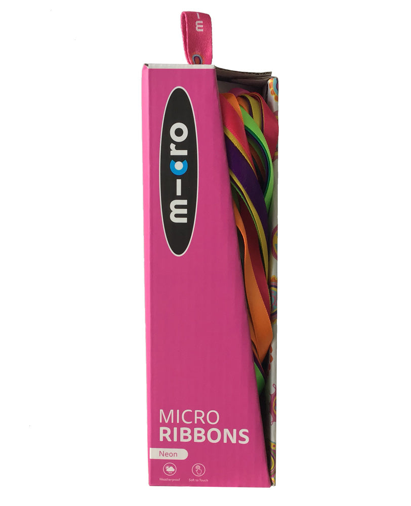 neon coloured ribbons in a gift box