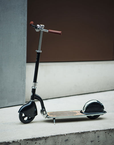 retro adult scooter with leather hand grips and compass