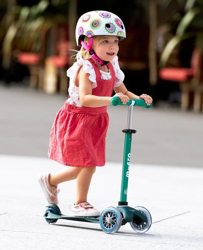 preschooler on her 3 wheel eco scooter